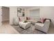 Spacious living room with comfortable sectional sofa and large artwork at 1322 W Indigo Dr, Chandler, AZ 85248