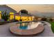 Well-maintained pool and spa at sunset at 1322 W Indigo Dr, Chandler, AZ 85248