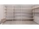 Empty storage room with built-in shelving at 1322 W Indigo Dr, Chandler, AZ 85248