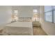 Bedroom with a queen-size bed, nightstands, and window blinds at 2228 E Isaiah Ave, Gilbert, AZ 85298