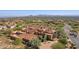 Large estate home nestled in a private community with desert landscaping at 42383 N 111Th Pl, Scottsdale, AZ 85262