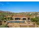 Luxury home with large pool, expansive patio, and scenic mountain views at 42383 N 111Th Pl, Scottsdale, AZ 85262