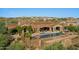 Luxury estate home with a large pool, patio, and beautiful mountain views at 42383 N 111Th Pl, Scottsdale, AZ 85262
