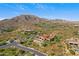 Luxury home with pool and patio situated on a hillside with mountain views at 42383 N 111Th Pl, Scottsdale, AZ 85262