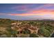 Stunning aerial view of a custom home with mountain views at 42383 N 111Th Pl, Scottsdale, AZ 85262