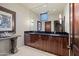 Bathroom boasts double sinks and large mirror, creating a spa-like feel at 42383 N 111Th Pl, Scottsdale, AZ 85262