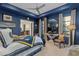 Spacious bedroom with a navy blue color scheme and ample natural light at 42383 N 111Th Pl, Scottsdale, AZ 85262