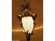 Ornate, antique-style bronze chandelier at 42383 N 111Th Pl, Scottsdale, AZ 85262