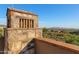 Stone chimney with mountain views in background at 42383 N 111Th Pl, Scottsdale, AZ 85262
