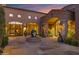 Charming courtyard with a fountain and arched doorways at 42383 N 111Th Pl, Scottsdale, AZ 85262