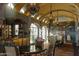 Elegant dining room features high ceilings, arched windows and a large table at 42383 N 111Th Pl, Scottsdale, AZ 85262