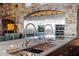 Modern kitchen with double sinks and marble countertop at 42383 N 111Th Pl, Scottsdale, AZ 85262