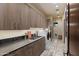 Functional laundry room with ample cabinetry and storage at 42383 N 111Th Pl, Scottsdale, AZ 85262
