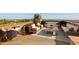 Spacious rooftop patio with outdoor seating and city views at 42383 N 111Th Pl, Scottsdale, AZ 85262
