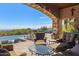 Relaxing covered patio with comfortable seating and stunning panoramic views at 42383 N 111Th Pl, Scottsdale, AZ 85262