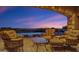 Relaxing poolside patio with stunning sunset views at 42383 N 111Th Pl, Scottsdale, AZ 85262