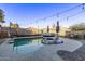 Relaxing swimming pool with patio furniture at 25772 W Nancy Ln, Buckeye, AZ 85326