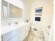 Elegant bathroom with double vanity, soaking tub, and tiled floors at 20 E Aero Rd, Mesa, AZ 85205