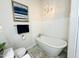 Bathroom with free-standing soaking tub and subway tile at 20 E Aero Rd, Mesa, AZ 85205