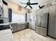 Modern kitchen with stainless steel appliances and white cabinets at 20 E Aero Rd, Mesa, AZ 85205
