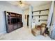 Gathering room with built-in shelving and comfortable seating at 20 E Aero Rd, Mesa, AZ 85205