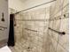 Walk-in shower with tiled surround and grab bars at 20 E Aero Rd, Mesa, AZ 85205
