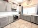 Modern kitchen with stainless steel appliances and white shaker cabinets at 20 E Aero Rd, Mesa, AZ 85205