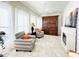 Cozy living room with fireplace and built-in entertainment center at 20 E Aero Rd, Mesa, AZ 85205