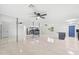 Open dining room with large mirror reflecting kitchen and living area at 8119 W Osborn Rd, Phoenix, AZ 85033