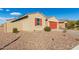 One-story home with a two-car garage and desert landscaping at 4512 W Suncup Dr, San Tan Valley, AZ 85144