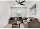 Cozy living room with sectional sofa and coffee table at 4512 W Suncup Dr, San Tan Valley, AZ 85144