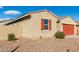 One-story home with a two-car garage and desert landscaping at 4512 W Suncup Dr, San Tan Valley, AZ 85144
