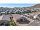 Aerial view of a house and surrounding neighborhood, showcasing the community and landscape at 4512 W Suncup Dr, San Tan Valley, AZ 85144