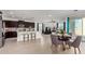 Open concept kitchen with granite island and stainless steel appliances at 4512 W Suncup Dr, San Tan Valley, AZ 85144