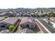 Aerial view of a house with solar panels and a backyard at 4512 W Suncup Dr, San Tan Valley, AZ 85144