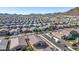 Aerial view of a house and surrounding neighborhood, showcasing the community and landscape at 4512 W Suncup Dr, San Tan Valley, AZ 85144