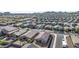 Aerial view of a large suburban neighborhood with houses and roads at 4512 W Suncup Dr, San Tan Valley, AZ 85144