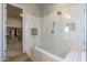 Clean bathroom with a walk-in shower and built-in bench at 18965 S 196Th Pl, Queen Creek, AZ 85142