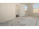 Bright bedroom with access to a private balcony at 14575 W Mountain View Blvd # 11312, Surprise, AZ 85374