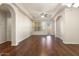 Spacious living room with hardwood floors and access to balcony at 14575 W Mountain View Blvd # 11312, Surprise, AZ 85374