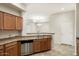 Modern kitchen with stainless steel appliances and ample cabinetry at 14575 W Mountain View Blvd # 11312, Surprise, AZ 85374