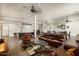 Community room with seating, game tables, and fireplace at 14575 W Mountain View Blvd # 11312, Surprise, AZ 85374