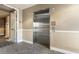 Building elevator with stainless steel doors and fire safety instructions at 14575 W Mountain View Blvd # 11312, Surprise, AZ 85374