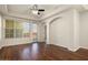 Bright living room featuring hardwood floors and ceiling fan at 14575 W Mountain View Blvd # 11312, Surprise, AZ 85374