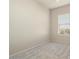 Spacious bedroom with neutral walls and plush carpeting at 14575 W Mountain View Blvd # 11312, Surprise, AZ 85374