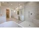 Bathroom with a large walk-in shower and soaking tub at 14930 W El Cortez Pl, Surprise, AZ 85387