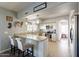 Eat-in kitchen with granite counters, stainless steel appliances, and breakfast bar at 242 E Stonebridge Dr, Gilbert, AZ 85234