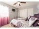 Cozy bedroom with a full-size bed and plenty of closet space at 242 E Stonebridge Dr, Gilbert, AZ 85234