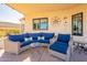Relaxing patio with wicker furniture and seating area at 242 E Stonebridge Dr, Gilbert, AZ 85234