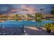 Waterfront property with sunset reflection at 242 E Stonebridge Dr, Gilbert, AZ 85234